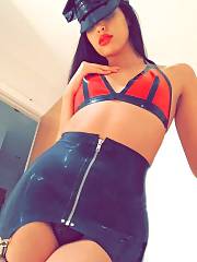 Mistress In Latex Bra And Skirt Flashing Her Panties