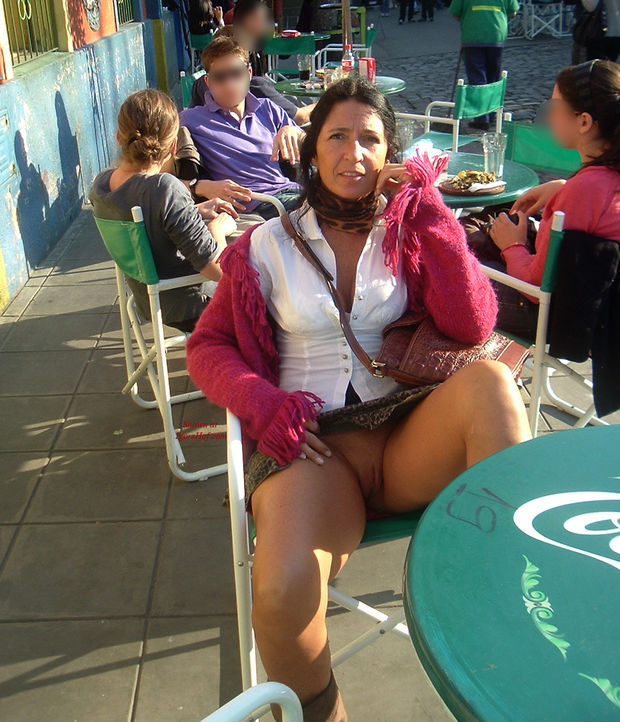 Short Skirt And No Panties At Street Cafe