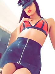 Mistress In Latex Bra And Skirt Flashing Her Panties
