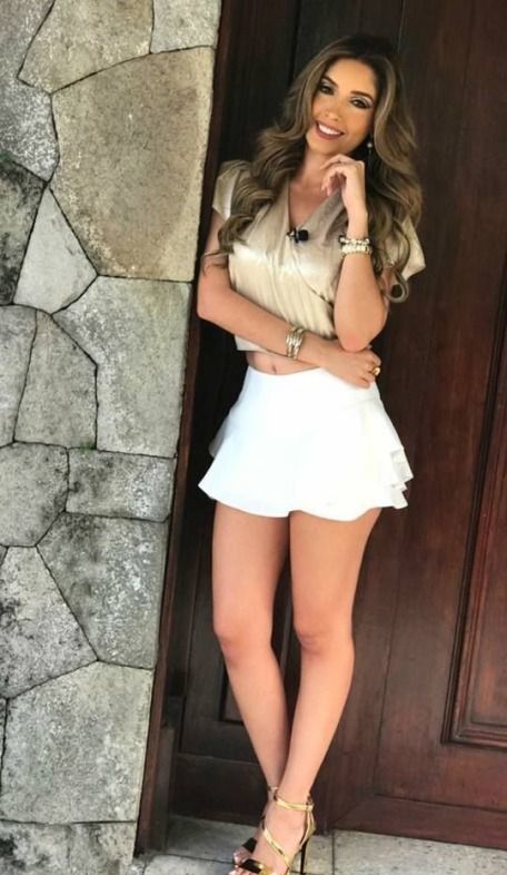 Pretty Woman In A Short White Skirt