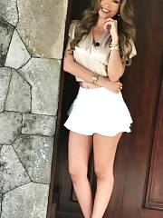 Pretty Woman In A Short White Skirt