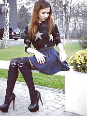 Lovly Dark Haired Posing Outdoors In Fancy Nylons Heels And Miniskirt