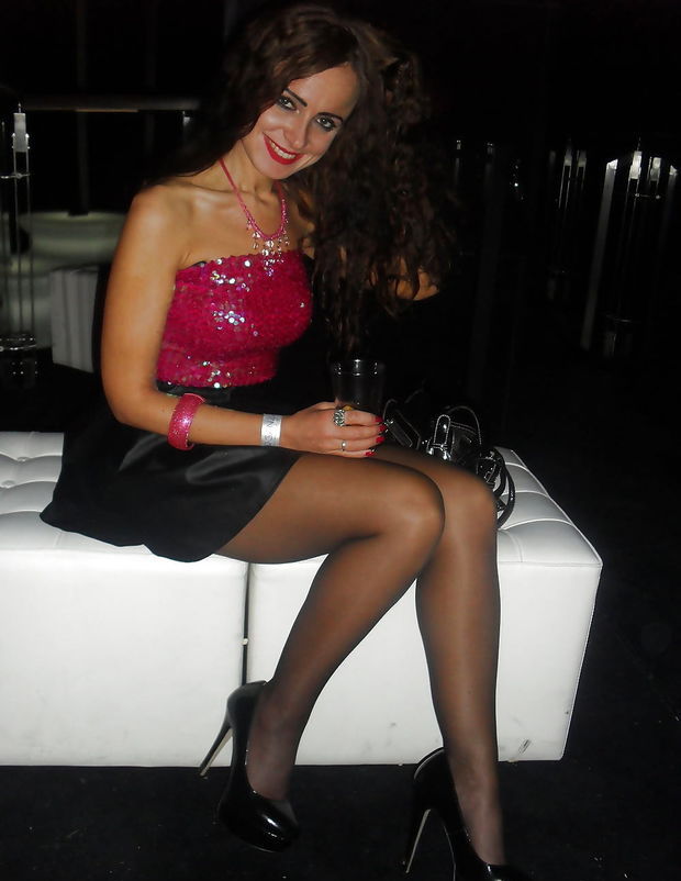 Sexual Party Girl In Really Short Flared Skirt And Shiny Pumps