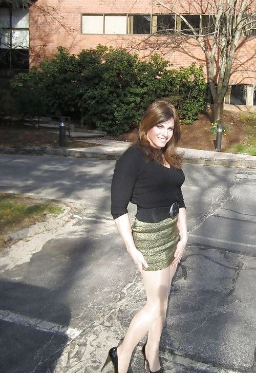 Cool Leggy Redhead Nymph Posing Outdoors In Mini Skirt