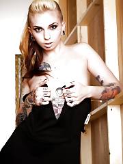 Tattooed Fetish Model Sierra Cure Revealing Tiny Titties & Hot Legs